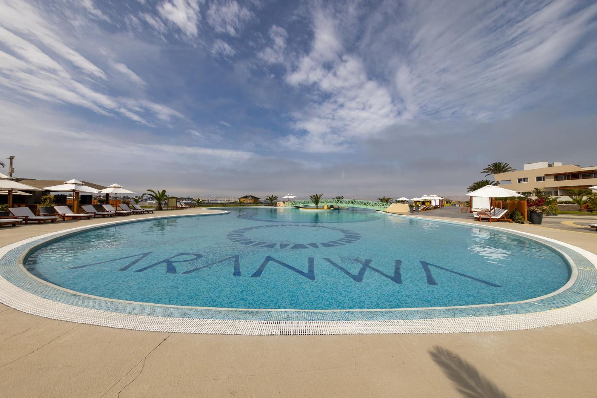 Aranwa Paracas Resort & Spa Exterior foto The swimming pool at the resort